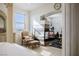Bright bedroom featuring a cozy fireplace and a separate workout area for ultimate comfort at 537 Blanche Ct, Henderson, NV 89052