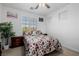 Cozy bedroom with natural light, plantation shutters and floral bedding for a cozy retreat at 537 Blanche Ct, Henderson, NV 89052