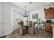 Charming breakfast nook featuring a glass table and chandelier at 537 Blanche Ct, Henderson, NV 89052