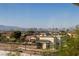 Scenic city view featuring mountains, a clear sky, and residential neighborhood homes at 537 Blanche Ct, Henderson, NV 89052