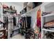 Walk-in closet with extensive storage, including shelves, rods, and shoe racks for optimal organization at 537 Blanche Ct, Henderson, NV 89052