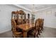 Elegant dining room featuring a large wooden table, ornate chairs, and a crystal chandelier at 537 Blanche Ct, Henderson, NV 89052