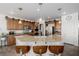 Kitchen features a large center island, granite countertops and stainless steel appliances at 537 Blanche Ct, Henderson, NV 89052