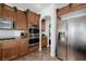 Modern kitchen features stainless appliances, double oven, and granite countertops at 537 Blanche Ct, Henderson, NV 89052