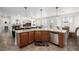 Kitchen island with sink boasts a seamless transition to the living area at 537 Blanche Ct, Henderson, NV 89052