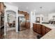 Well-equipped kitchen connects to dining room and living room creating an open layout at 537 Blanche Ct, Henderson, NV 89052