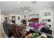 Inviting living room with a fireplace, TV, and comfortable seating arrangement at 537 Blanche Ct, Henderson, NV 89052