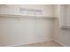 Spacious walk-in closet with shelving and a window providing natural light at 5861 Lakeland Village Dr, North Las Vegas, NV 89081