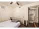 Small bedroom featuring neutral paint, a closet and a ceiling fan at 6320 Peppermill Dr, Las Vegas, NV 89146