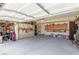 Spacious garage features storage cabinets and ample room for parking at 6320 Peppermill Dr, Las Vegas, NV 89146