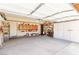 Spacious garage features storage cabinets and ample room for parking at 6320 Peppermill Dr, Las Vegas, NV 89146