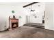 Spacious living room with a brick fireplace and vaulted ceiling at 6320 Peppermill Dr, Las Vegas, NV 89146