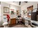 Utility Room includes a sink, toilet, desk, shelving, and decorations at 6320 Peppermill Dr, Las Vegas, NV 89146