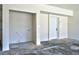 Garage featuring unfinished flooring, laundry hookups, and access door at 6628 Silver Penny Ave, Las Vegas, NV 89108