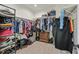 Walk-in closet with ample storage space and organization racks for clothes, shoes, and accessories at 748 Canfield Point Ave, Las Vegas, NV 89183