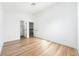 Neutral bedroom with an open doorway and closet at 7832 Desert Candle Way, Las Vegas, NV 89128