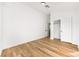 Minimalist bedroom with light-colored walls and floors, and closet access at 7832 Desert Candle Way, Las Vegas, NV 89128