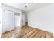 Bright bedroom with new floors, a closet, and access to an ensuite bathroom at 7832 Desert Candle Way, Las Vegas, NV 89128