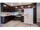 Well-equipped kitchen featuring stainless appliances, white countertops, and generous cabinets at 815 Center St, Henderson, NV 89015