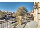 Neighborhood view from private balcony overlooking a landscaped street at 8456 Blackstone Ridge Ct, Las Vegas, NV 89139