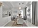Stylish dining room featuring a modern chandelier and elegant decor, perfect for entertaining at 8456 Blackstone Ridge Ct, Las Vegas, NV 89139