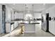 Bright, renovated kitchen featuring an island and stainless steel appliances at 8456 Blackstone Ridge Ct, Las Vegas, NV 89139