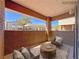 Private balcony with outdoor seating, textured walls, and community views at 9000 Las Vegas Blvd # 1097, Las Vegas, NV 89123