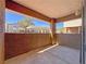 Private balcony with textured walls and community views under a bright blue sky at 9000 Las Vegas Blvd # 1097, Las Vegas, NV 89123