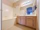 Well-lit bathroom featuring a single sink vanity and bath and shower combo at 9000 Las Vegas Blvd # 1097, Las Vegas, NV 89123