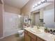 Bright bathroom featuring a shower over the bath, single sink vanity, and neutral decor at 9000 Las Vegas Blvd # 1097, Las Vegas, NV 89123