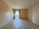 Empty bedroom with neutral walls, wood-look flooring, and sliding doors to balcony at 9000 Las Vegas Blvd # 1097, Las Vegas, NV 89123