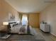 Cozy bedroom features neutral tones, wood-look flooring, and balcony access at 9000 Las Vegas Blvd # 1097, Las Vegas, NV 89123