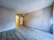 Neutral bedroom with wood-look flooring, and doors to the closet and ensuite bathroom at 9000 Las Vegas Blvd # 1097, Las Vegas, NV 89123