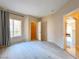 Well-lit bedroom featuring closet, ensuite access, and large window at 9000 Las Vegas Blvd # 1097, Las Vegas, NV 89123