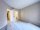 Neutral bedroom with wood-look flooring, and doors to the closet and ensuite bathroom at 9000 Las Vegas Blvd # 1097, Las Vegas, NV 89123