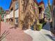 View of the building exterior featuring a staircase, windows and landscaping at 9000 Las Vegas Blvd # 1097, Las Vegas, NV 89123