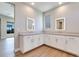 Bathroom featuring double sinks, vanity, and modern fixtures at 990 Golden Summit Dr, Las Vegas, NV 89138