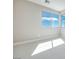 Bright bedroom with a large window at 990 Golden Summit Dr, Las Vegas, NV 89138