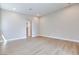 Spacious living room with light wood flooring, and neutral walls at 990 Golden Summit Dr, Las Vegas, NV 89138