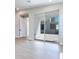 Living space with sliding doors to backyard and light wood flooring at 990 Golden Summit Dr, Las Vegas, NV 89138