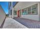 Beautiful front porch with a red door at 991 Golden Summit Ave, Las Vegas, NV 89138