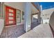 Inviting entryway with brickwork and a bright red front door at 991 Golden Summit Ave, Las Vegas, NV 89138
