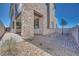 Inviting two-story home with stone accents and landscaped front yard at 991 Golden Summit Ave, Las Vegas, NV 89138