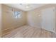 Bedroom featuring a ceiling fan, window, and door to the exterior at 9917 Arbuckle Dr, Las Vegas, NV 89134