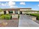 Exterior view of the fitness center with well-maintained landscaping and a welcoming entrance at 9917 Arbuckle Dr, Las Vegas, NV 89134