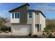 A charming two-story home with a two car garage and neutral color palette at 10004 River Corral St, Las Vegas, NV 89166