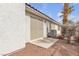 Backyard with a patio and desert landscaping, offering a private outdoor space at 10035 Oak Creek Canyon Ave, Las Vegas, NV 89147