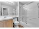 Stylish bathroom with modern fixtures, featuring a sleek glass shower and vanity with sink at 10035 Oak Creek Canyon Ave, Las Vegas, NV 89147