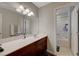 Bathroom with vanity and sink with a tile floor and a tub and shower combo at 10722 Red Badge Ave, Las Vegas, NV 89166