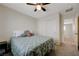 Comfortable bedroom with a cozy bed, closet, and a neutral color scheme at 10722 Red Badge Ave, Las Vegas, NV 89166